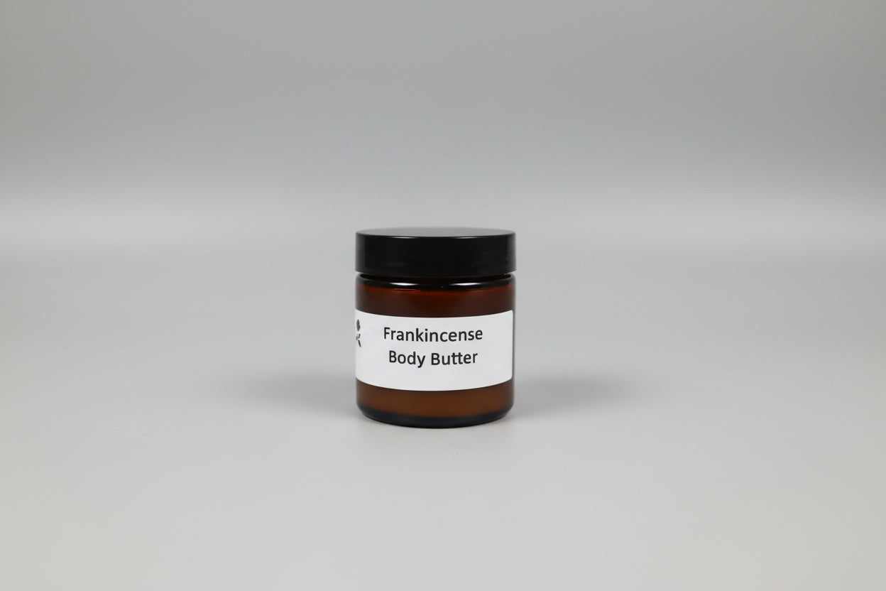 Creamy Tallow Body Butter from The Rose Soaps Candles Etc, shown in a jar with a smooth, rich texture perfect for moisturizing skin.